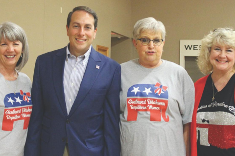 Photo courtesy of John Madison Clinton Political commentator and author Tom Basile, keynote speaker at the 11th annual Beans and Baskets GOP fundraiser, visits with several Republican women. Pictured are Donna Alton, Harmon County Republican chair; Basile; Deb Davis, Southwest Oklahoma Republican Women president; and Lorie Legere, state president of the Oklahoma Federation of Republican Women.