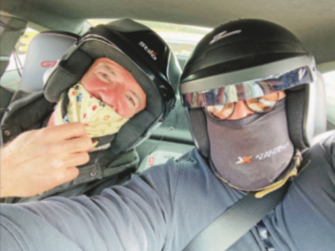 Ledger photo by M. Scott Carter Extreme Experience driving instructor Fred Sontag, left, and the author inside the 911 