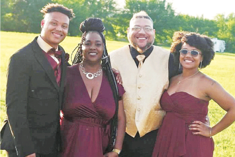From left are D'Shaun, Nicole, Dwayne and E'Lexus Merriweather. Dwayne and Nicole Merriweather will take over All Things Embroidered in Lawton in January. The Merriweathers say the children plan on helping with the business during the summer and holidays so they will be a part if it too. 