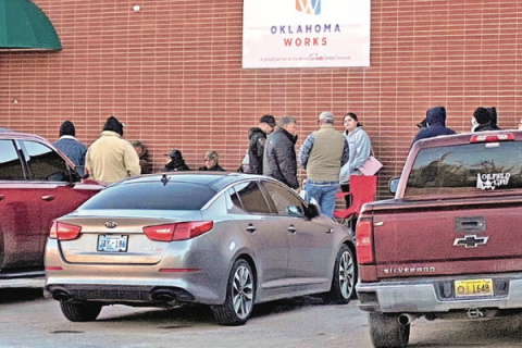 Ledger photo by Curtis Awbrey       A line had formed outside the Department of Public Safety office in Chickasha by 8 a.m. Monday.