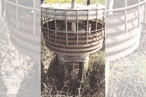 Photo courtesy Oklahoma Conservation Commission               The Wildhorse Creek 85 dam in Garvin County is among the structures that have deteriorated corrugated metal pipe components, such as this riser facing the front slope.