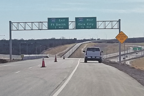 Ledger photo by Andrew W. Griffin                          A motorist travels on the newly opened Kickapoo Turnpike.