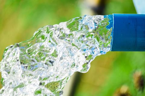 Water pouring out of pipe