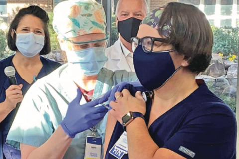 Comanche County Memorial Hospital photo via Facebook                    A registered nurse receives a dose of the COVID-19 vaccine Dec. 16, 2020, after a press conference at Comanche County Memorial Hospital in Lawton.