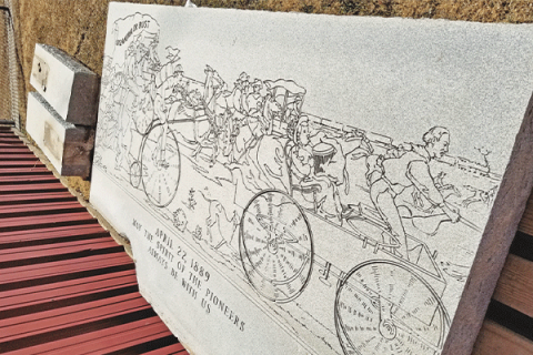 Ledger photo by Andrew W. Griffin A monument depicting the April 22, 1889, Oklahoma Land Run is in storage on the campus of Oklahoma City Community College.