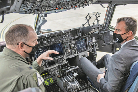 Air Force Photo by Senior Airman Brenna Klemm, 97th Air Mobility Wing Public Affirs, File: U.S. Air Force Col. Matthew Leard, 97th  Air Mobility Wing commander, talks to OK Gov. Kevin Stitt on C-17 Globemaster III at Altus Air base. 