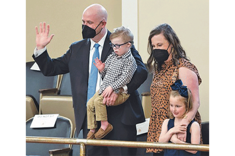 Rhys, Everett, Neely, and Lily Gay are introduced in the Oklahoma Senate gallery after "Everett's Law" is approved by the state Senate in March. The new state law prohibits discrimination against a potential organ transplant recipient based solely on the person's physical or mental disability.