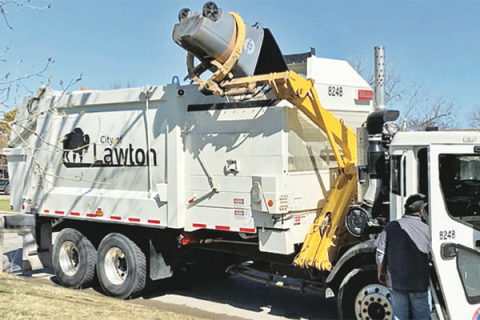 LEDGER FILE PHOTO BY KYLETTA RAY Budget talks have included adding a “rolling stock fee” to utility bills to go toward maintaining city vehicles such as trash collection trucks.