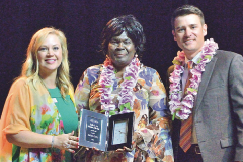 LAWTON FORT SILL CHAMBER OF COMMERCE PHOTO Dr. Krista Ratliff, left, president and CEO of Lawton-Fort Sill Chamber of Commerce, and Mark Scott, right, board chairman, present the Shelia O. Lee Volunteer of the Year award to Barbara E. Curry.