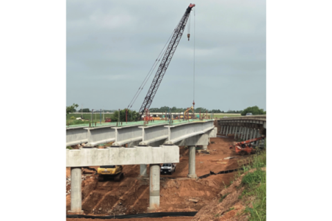 LEDGER PHOTO BY CURTIS AWBREY Beams have been installed for the new eastbound bridge on US-62 over the Washita River in Chickasha, just east of the H.E. Bailey Turnpike.