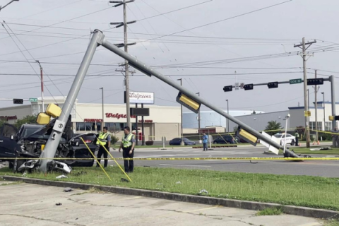 Traffic light at 67th and Cache Road knocked down by fatal traffic accident.