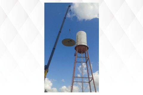 Photo courtesy Roosevelt Mayor Nolan McCall. REAP grants have financed significant repairs to the “Bronco” water tower in Roosevelt, a Kiowa County town of about 225 residents. Several REAP grants from SWODA and the Oklahoma Water Resources Board, coupled with town revenues, paid for several safety repairs and a new roof for the water tank.