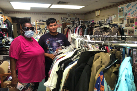 Edna Douglas stands with a volunteer at the Mission on Wheels location in downtown Altus. LEDGER PHOTO BY TIM FARLEY