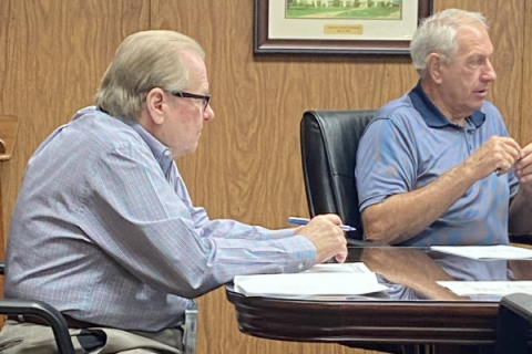 From the left, Comanche County Commissioners Johnny Owens and Gail Turner prepare for a meeting Monday at the Comanche County Courthouse. The board delayed action on the Pecan Valley Water Works Association's petition to organize a water district.