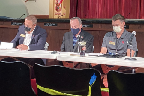 LEDGER PHOTO BY ERIC SWANSON From left, Deputy City Manager Dewayne Burk, City Manager Michael Cleghorn and City Attorney John Ratliff wait for a press conference to begin Monday at Lawton City Hall. City officials hosted the event to update people about the city’s labor shortage.