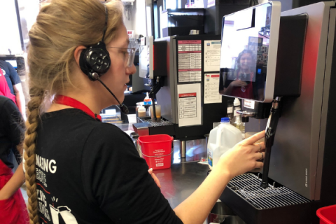 Employee Jackie Hampton prepares one of the orders at Scooter’s Coffee in Lawton. The coffee shop, which opened in late June, hosted a ribbon cutting Aug. 6. Ledger photo by Tim Farley