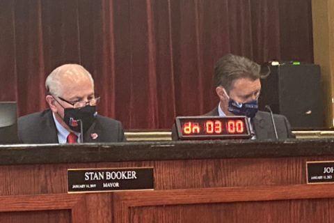 From the left: Lawton Mayor Stan Booker and City Attorney John Ratliff are shown during Tuesday's Lawton City Council meeting. Booker apologized for his role in an inaccurate report of an OSBI investigation.   Eric Swanson/Ledger photo