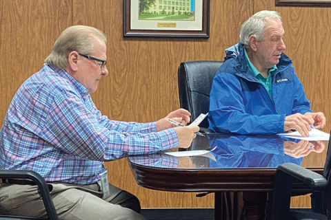 Comanche County Commissioners Johnny Owens, left, and Gail Turner review documents during the Board of Comanche County Commissioners’ meeting Monday at the Comanche County Courthouse. The commission postponed a closed-door session to discuss employee-related negotiations over possible premium pay for a certain group of workers. ERIC SWANSON/LEDGER PHOTO