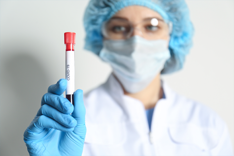 Nurse holding Covid test results