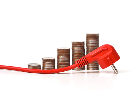 Increasing stack of coins behind an electric plug