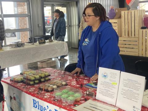 Blue’s Bake House owner/baker Sky McWhorter waits for customers Saturday at the new Farmers Market building in downtown Lawton. Saturday was the official opening day for the market in its permanent home. Eric Swanson/Ledger photo