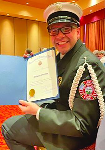 Lawton’s Assistant Fire Marshal, Anthony Garibay, proudly shows off his certificate of appreciation from the Veterans of Foreign Wars Department of Oklahoma. Garibay accepted the honor during the VFW’s Honors Banquet Feb. 19 in Norman. Photo courtesy city of Lawton