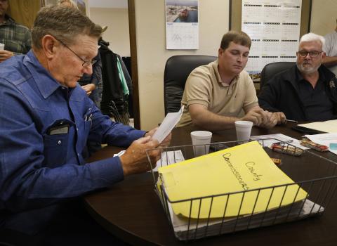 McCurtain County Commissioners Jimmy Westbrook, Chris White and Mark Jennings vote to table a petition to hold a public vote on the incorporation of the small town of Hochatown. Residents of the town have, for several years, attempted to incorporate. Monday’s vote delays that effort.  Ledger photo by Rip Stell