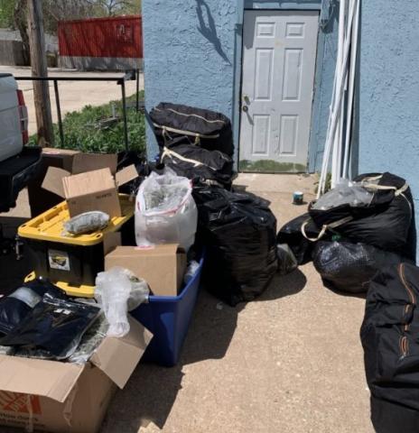 Processed marijuana was found in duffel bags at the rear of a marijuana dispensary in Midwest City during a raid by the Oklahoma Bureau of Narcotics and Dangerous Drugs Control.  Photo courtesy OBNDD
