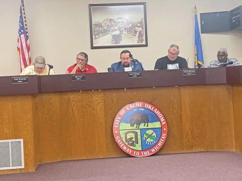 Caption: From the left, Cache City Council members Flint Runyan, Ken Lyon, Scott Brown, Steve Red Elk and Mark Hill Sr. listen to a discussion during a special meeting Wednesday at Cache City Hall. Following a closed session, the council voted to suspend Police Chief Michael Crank and Animal Control Officer Alicia Hainline for two days without pay. However, the council did not take disciplinary action against Probationary Patrol Officer Kylie Kutmen.  Eric Swanson/Staff Photo