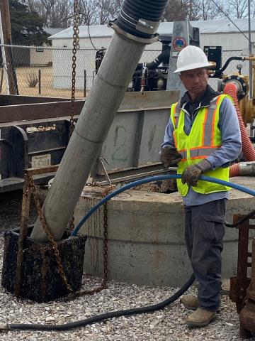 Caption 101: Thierry Schroeder, principal equipment operator for Lawton’s wastewater collection division, cleans out a catch basket March 17 at George Lee Park in Lawton. The city is urging residents to throw flushable wipes in the trash instead of flushing them down the toilet, which can cause blockages in sewer lines. Eric Swanson/Staff photo
