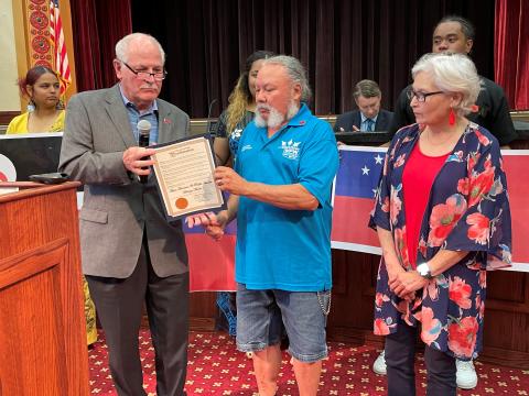 Caption: From the left, Lawton Mayor Stan Booker presents a proclamation for Asian American and Pacific Islander Heritage Month to Race Relations Committee Vice Chair George Keck and Secretary Mary Fountain on May 10 at Lawton City Hall. Bekah Kobayashi/Staff photo