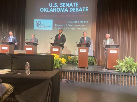 From the left, candidates Luke Holland, Robert Murphy, T.W. Shannon, John Tompkins and Ray Woods listen to a question during a debate Monday at Cameron University Theater. The five men are competing against 11 other candidates in the race to replace U.S. Sen. Jim Inhofe, who is retiring Jan. 3, 2023.