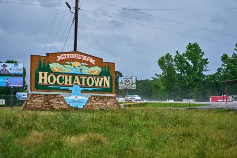 Vehicles pass by a "Welcome To Hochatown" sign in McCurtain County Christopher Bryan/Photo Provided