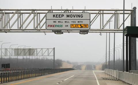 The on/off ramps at the Walters exit on the H.E. Bailey Turnpike will be closed temporarily in August for removal of manual toll-collection receptacles such as this one. Coin collection machines on Oklahoma’s toll roads, are being scrapped, at least in part because “they have to be specially manufactured because nobody uses them anymore,” Turnpike Authority Executive Director Tim Gatz explained.   This newly installed sign informs drivers on the southern leg of the H.E. Bailey Turnpike that the Walters gate