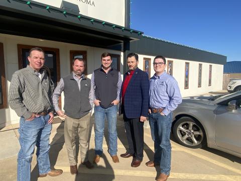 Eric Swanson | Southwest Ledger Farm Credit of Western Oklahoma officials Erral Myers, Kyle Dorton, Toby Denny, John Grunewald and Jake Ochsner are shown Dec. 15 in front of the cooperative’s Chattanooga field office. The cooperative hosted a holiday open house Dec. 15 at the Chattanooga office. 
