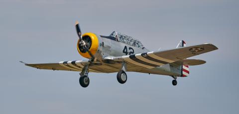 A North American Aviation AT-6 “Texan” advanced trainer piloted by Ashley Shelton, with her husband, Gregg, in the rear seat, flew around Chickasha during the annual air show in 2020. CHRISTOPHER BRYAN | SOUTHWEST LEDGER | Southwest Ledger