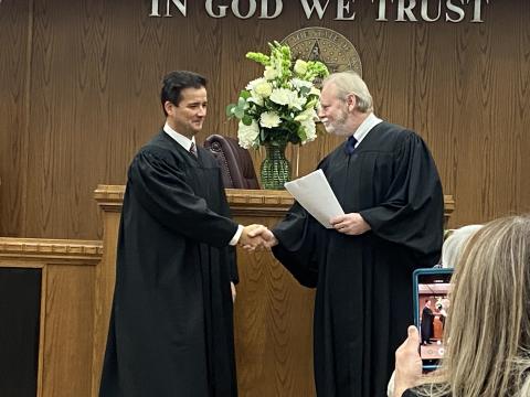  From the left, Comanche County District Judge Grant Sheperd shakes hands with District Judge Emmit Tayloe after Sheperd was sworn into office Monday at the Comanche County Courthouse. ERIC SWANSON | SOUTHWEST LEDGER