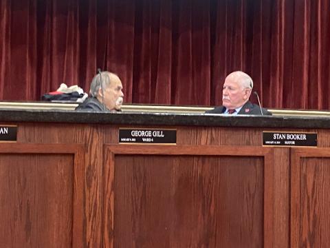 From the left, Lawton City Councilman George Gill talks with Mayor Stan Booker before the council’s Jan. 24 meeting. The council heard a report on the city’s hotel/motel tax revenues for FY 2022-23 but did not act on the report.  ERIC SWANSON | SOUTHWEST LEDGER