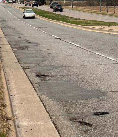 Numerous potholes have been patched in the northbound lanes of 38th Street immediately south of Gore Boulevard. MIKE W. RAY | SOUTHWEST LEDGER