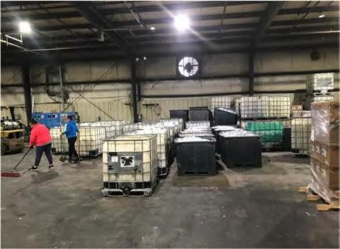 De-packaged hand sanitizer bottles are stacked in totes prior to being run through a shredder at a Glycerin Traders facility in LaPorte, Indiana. THERESA PICHTEL | INDIANA DEPT. OF ENVIRONMENTAL MANAGEMENT