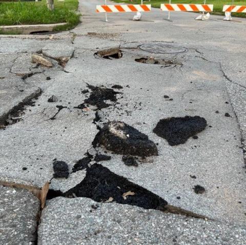 The intersection of 14th Street and Missouri Avenue in Chickasha was heavily damaged by runoff rainwater in a May 13 storm. MIKE W. RAY | SOUTHWEST LEDGER