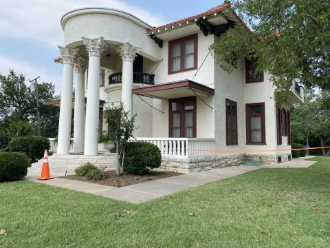 In addition to portions of its wrought iron fence, gutters, window screens, trees and security lights, a recent hailstorm damaged many sections of terracotta tile roof along the north side of Lawton’s Historic Mattie Beal Home.  Prior to Oklahoma statehood, Beal, an unmarried telephone operator from Kansas, won the 160-acre tract of land, as hers was the second name drawn in the 1901 Land Lottery. TORI WHITE | SOUTHWEST LEDGER