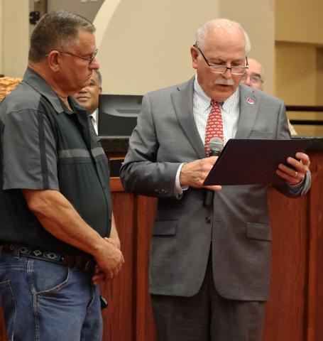 Donald Wayne Smith looks on as Mayor Stan Booker reads a citation honoring him for his “swift and selfless thinking while on the job.” Smith, a window installer, detected a natural-gas leak at a customer’s home, evacuated the elderly occupants and notified the gas company. Smith’s actions “serve as an inspiring example of how one person’s intervention can safeguard lives” and exemplified “the spirit of a Good Samaritan,” the Mayor’s Citation of Valor declared. CITY OF LAWTON