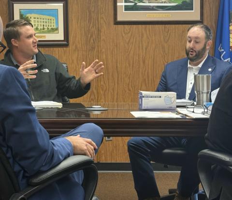 Bryanna Ramos | Southwest Ledger Comanche County Commissioner Ryan John, left, and Commission Chairman Josh Powers, right, exchange words during a heated commissioners’ meeting Monday morning. District Attorney Kyle Cabelka has his back to the camera.