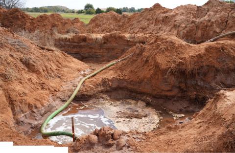 Saltwater discharging from this purge site in Caddo County has slowed but was still flowing at more than 1,400 barrels per day last week. Kyletta Ray | Southwest Ledger