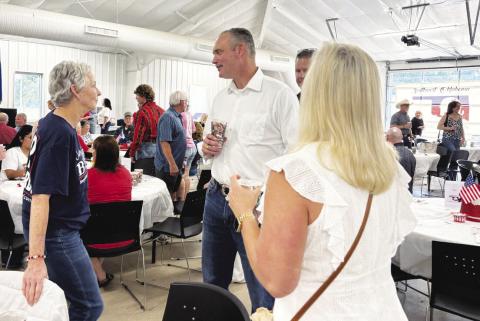 Charles McCall speaks with a Cindy Byrd supporter during the Southwest Oklahoma Republican Women’s Beans &amp; Baskets fundraiser held July 26 at the Altus Community Center. McCall, a former Speaker of the Oklahoma House of Representatives, is running for governor; State Auditor &amp; Inspector Byrd is running for lieutenant governor. Mindy Ragan Wood | Southwest Ledger