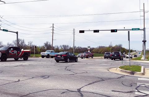 Curtis W. Awbrey | Southwest Ledger Monday afternoon traffic travels north and south along 38th Street at Lee Boulevard. Lawton-based T&amp;G Construction won a $4.349 million contract to improve the mile-long section of 38th Street between Gore and Lee boulevards. T&amp;G’s bid was 22.8% lower than the engineer’s $5.635 million estimate.