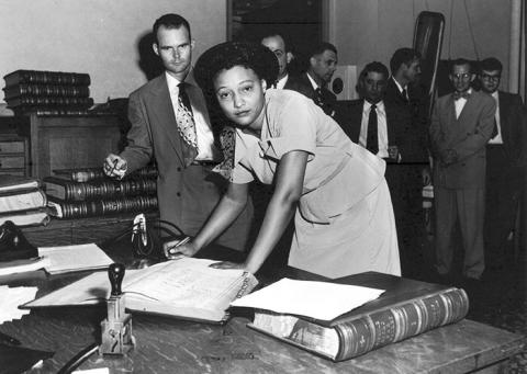 Ada Sipuel Fisher signs the register of attorneys in 1952. Oklahoma Historical Society
