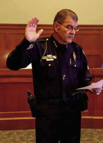 Facebook Photo Goebel G. Music recites the oath Chickasha’s Chief of Police three years ago.