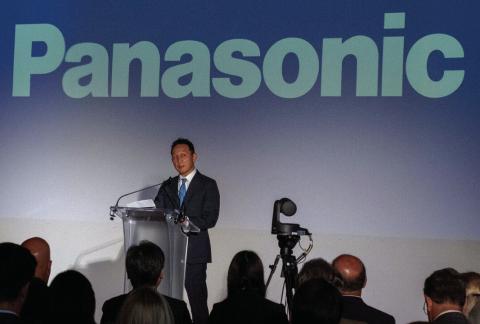 Kris Takamoto, the executive vice president of Panasonic’s North America division, announces the $4 billion De Soto battery plant in 2022 in Topeka. Decreasing electric vehicle sales and changing U.S. policies are changing the plant’s timeline to full production. Sherman Smith | Kansas Reflector